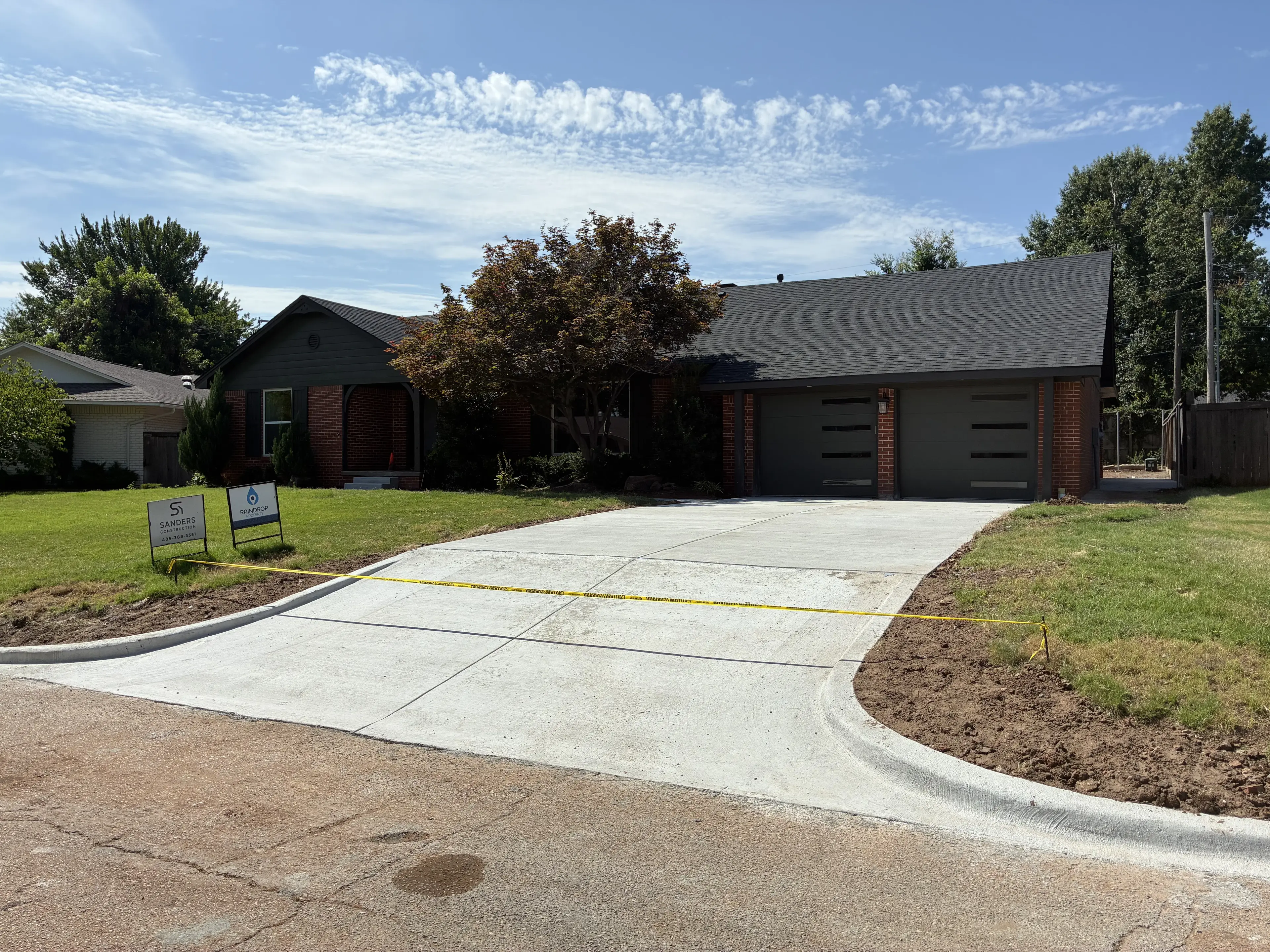 Concrete Drive and Sidewalks for Village Home Remodel main image