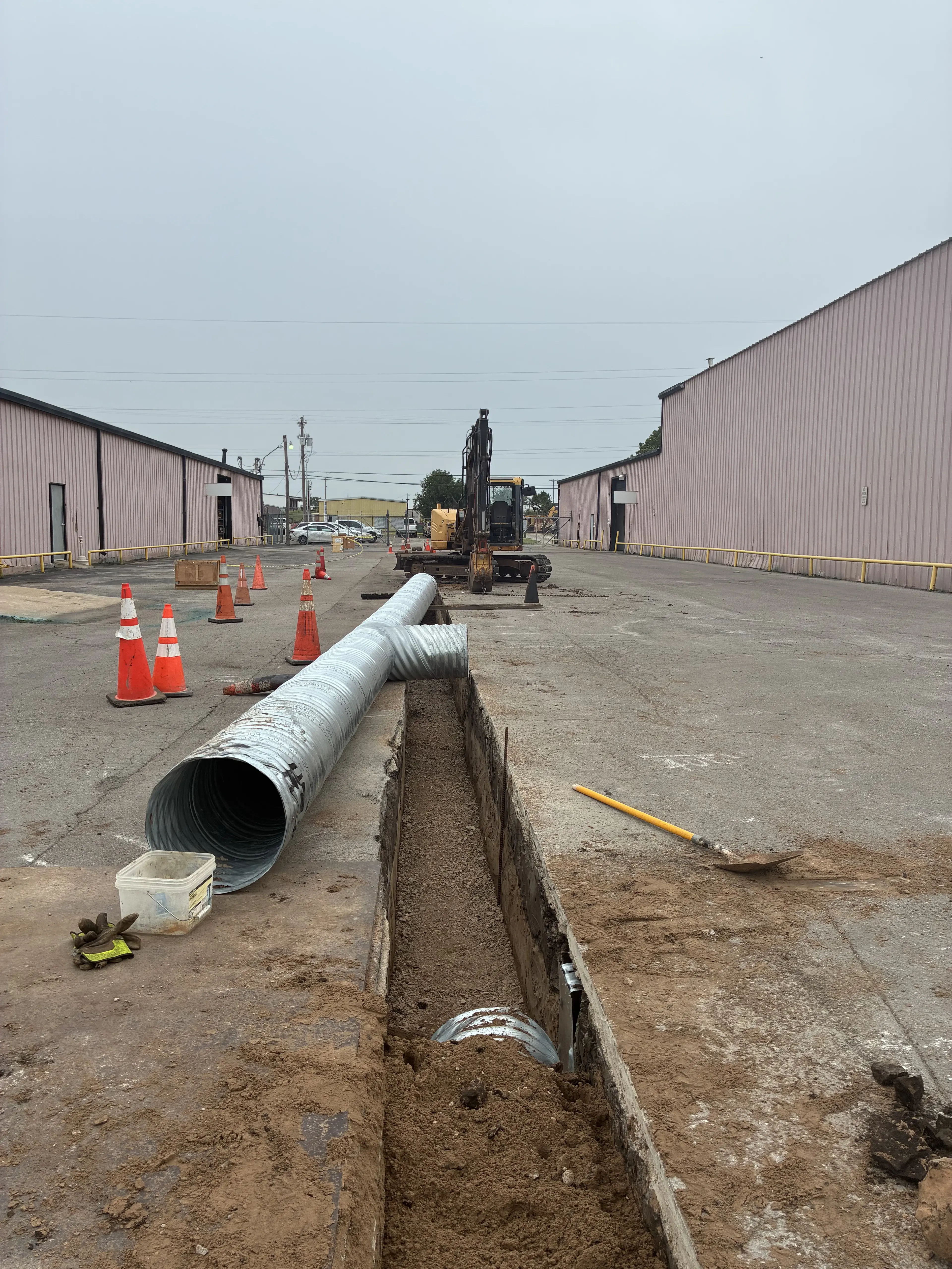 Stormwater Drain with Graded Asphalt Repairs supporting image 1